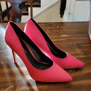 Hot pink high heels.